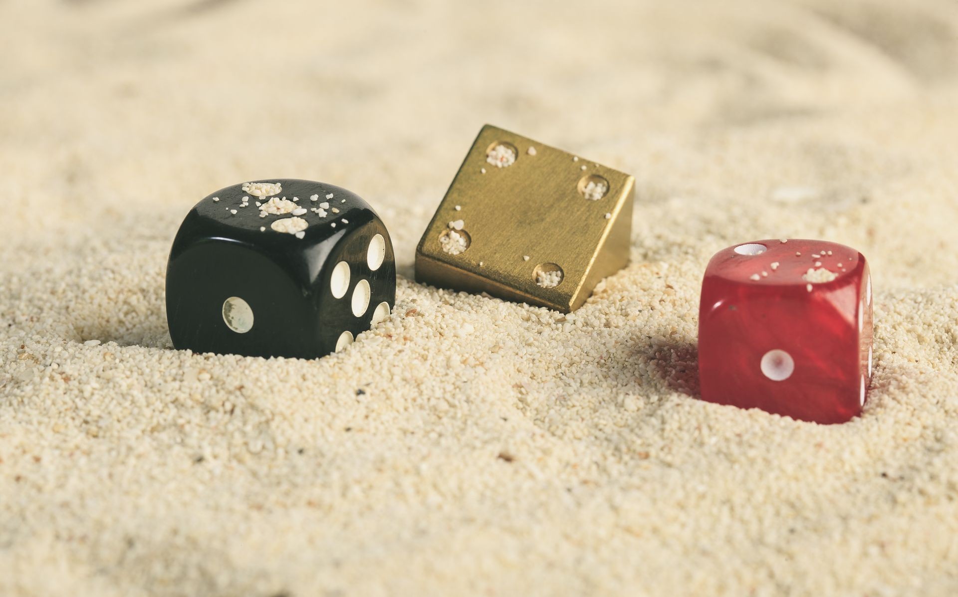 some dices in the sand dunes